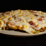 Patacón con maicitos